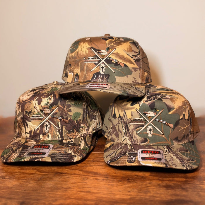 Otto camo snapbacks with a detailed multi-color embroidered duck hunting logo