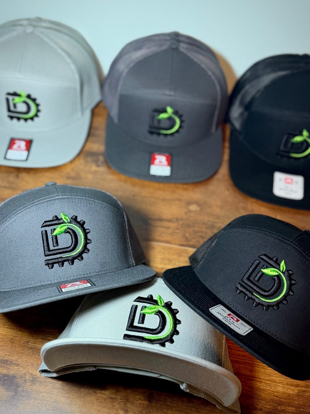 Richardson 7-panel truckers with a 3D puff embroidered gear logo