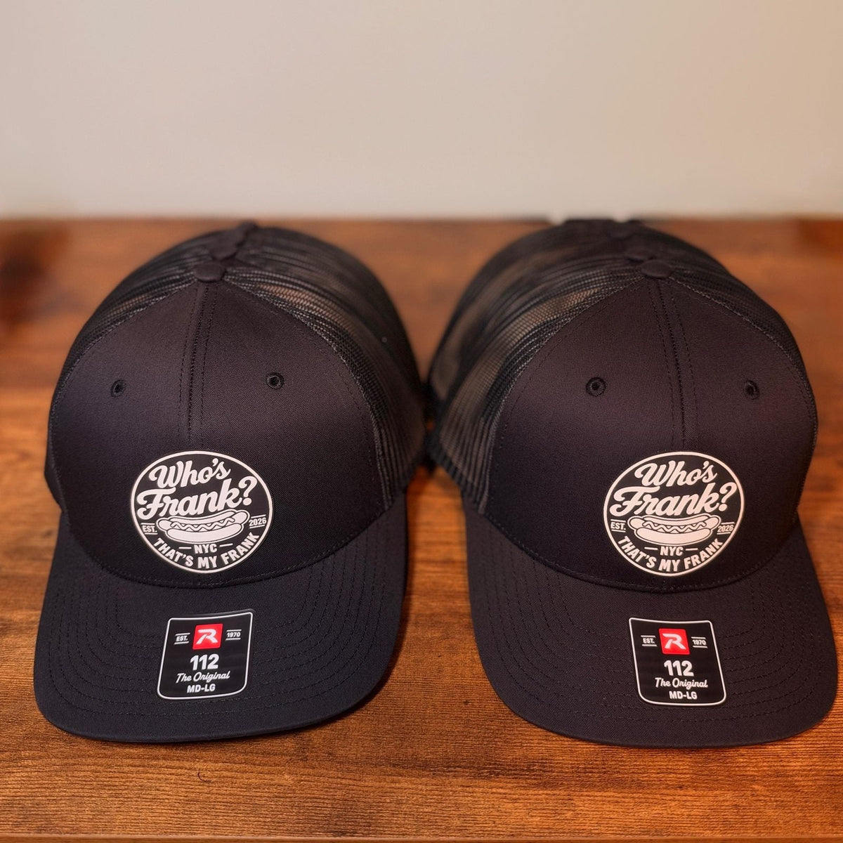 Black Richardson 112 truckers with a round white leatherette patch, laser engraved